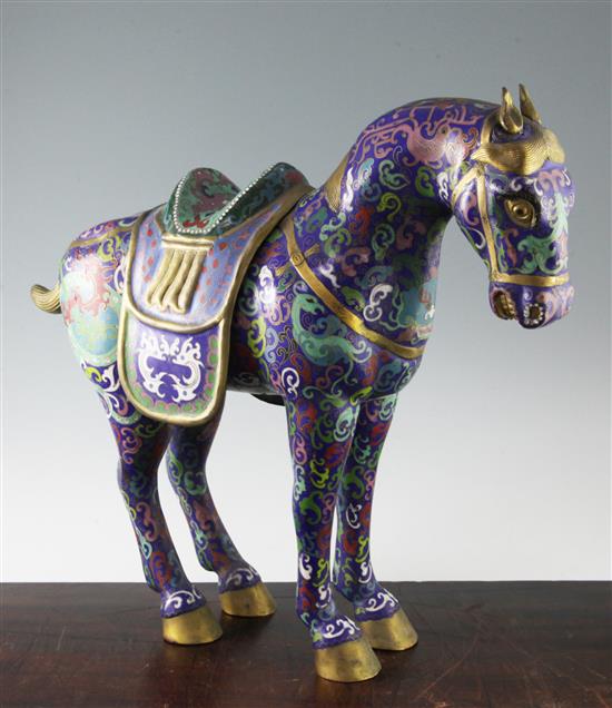 A Chinese cloisonne enamel model of a saddled horse, 18in.